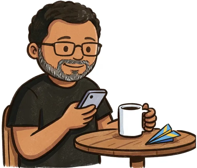 Jay at a cafe table with a coffee, checking a deal on his phone.